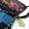 A pure handcrafted Miao embroidery tie-dye and batik intangible cultural heritage skirt bag Application Scenario
